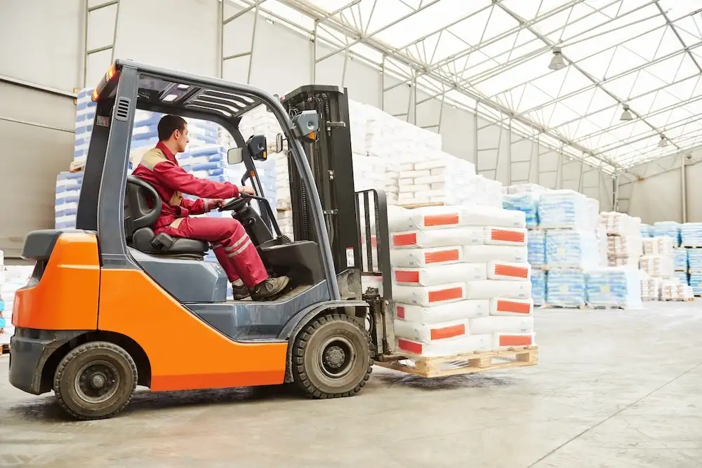 a forklift is working in a warehouse